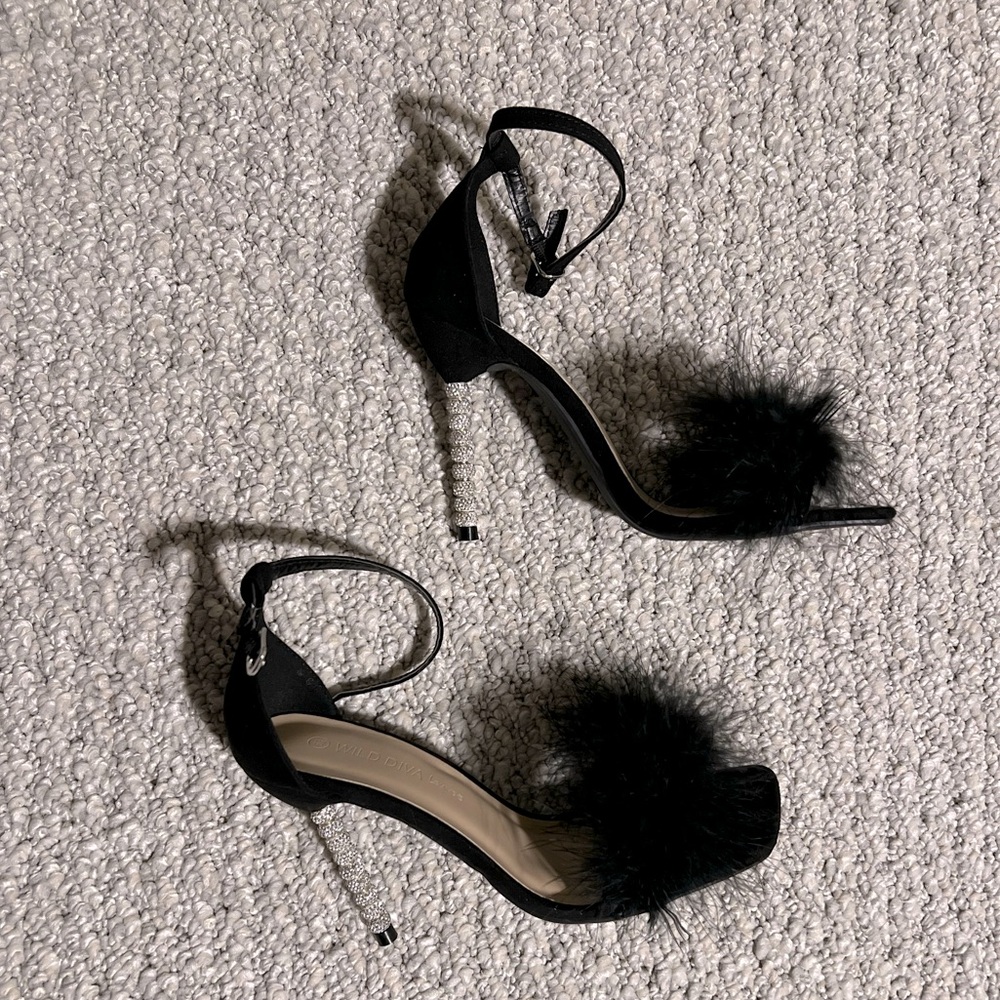 Feather black pumps with rhinestone heel